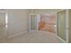 Upstairs hallway boasts neutral tones and leads to other rooms in the home at 10761 Capesthorne Way, Las Vegas, NV 89135
