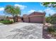 Charming single-story home featuring a neutral color scheme and a spacious two-car garage at 11244 Gammila Dr, Las Vegas, NV 89141