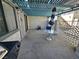 Wide patio with table, chairs, bbq and textured wall visible at 1128 Willow Tree Dr # C, Las Vegas, NV 89128