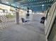 Outdoor patio space with pergola cover, table, chairs, and BBQ at 1128 Willow Tree Dr # C, Las Vegas, NV 89128