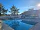 Relaxing community pool setting with ample seating and clear, inviting water at 1128 Willow Tree Dr # C, Las Vegas, NV 89128