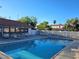 Enjoy the community pool with comfortable seating, great for relaxing and socializing at 1128 Willow Tree Dr # C, Las Vegas, NV 89128