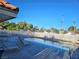 Enjoy the community pool with lounge chairs, perfect for sunny days and relaxation at 1128 Willow Tree Dr # C, Las Vegas, NV 89128