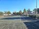 View of a well maintained community tennis court with a clear blue sky at 1128 Willow Tree Dr # C, Las Vegas, NV 89128