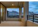 A beautiful outdoor patio space with mountain views on a cloudy day at 180 Native Stone St, Las Vegas, NV 89138