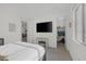 Minimal bedroom featuring ample light, TV and closet space access at 180 Native Stone St, Las Vegas, NV 89138