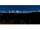 Captivating night view showcasing the Las Vegas skyline and city lights at 180 Native Stone St, Las Vegas, NV 89138