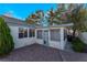 A cozy screened in porch overlooking the well maintained backyard at 2086 Angel Falls Dr, Henderson, NV 89074