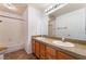 Full bath includes a double vanity, bathtub, and tiled floors at 2086 Angel Falls Dr, Henderson, NV 89074