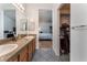 Bathroom featuring granite countertop and plenty of storage space, with access to the bedroom at 2086 Angel Falls Dr, Henderson, NV 89074