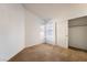 A bedroom with large windows at 2086 Angel Falls Dr, Henderson, NV 89074