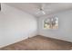 Bedroom with neutral carpet, a ceiling fan, and a window at 2086 Angel Falls Dr, Henderson, NV 89074