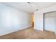 Bedroom with neutral carpet, a ceiling fan and closet at 2086 Angel Falls Dr, Henderson, NV 89074