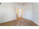 Bedroom with bright walls, carpet and double doors to bathroom at 2086 Angel Falls Dr, Henderson, NV 89074