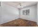 Neutral bedroom with carpet, window, ceiling fan, and ample natural light at 2086 Angel Falls Dr, Henderson, NV 89074