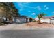Single-story home featuring an attached two-car garage and desert landscaping at 2086 Angel Falls Dr, Henderson, NV 89074