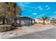Cozy single-story home with a two-car garage and low-maintenance desert landscaping at 2086 Angel Falls Dr, Henderson, NV 89074
