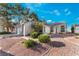 Charming single-story home with a well-maintained front yard and desert landscaping at 2086 Angel Falls Dr, Henderson, NV 89074