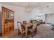 Open-concept living area with dining table, chairs, natural light, and comfortable seating at 2086 Angel Falls Dr, Henderson, NV 89074