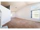 Spacious living room features neutral tones and natural light at 2086 Angel Falls Dr, Henderson, NV 89074