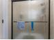 Bathroom shower with frosted glass doors and modern hardware for added privacy at 2086 Angel Falls Dr, Henderson, NV 89074