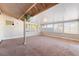 Spacious sun room with neutral carpet and plenty of natural light at 2086 Angel Falls Dr, Henderson, NV 89074