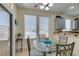 Breakfast nook with natural light and a view of the kitchen and backyard at 2114 High Mesa Dr, Henderson, NV 89012