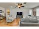 Bright living room featuring hardwood floors, recessed lighting, and neutral decor at 2114 High Mesa Dr, Henderson, NV 89012