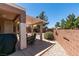 Covered patio with outdoor seating and a grill, perfect for entertaining in a private backyard setting at 2114 High Mesa Dr, Henderson, NV 89012
