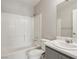 Clean bathroom with a shower-tub combo, and a large mirror above the sink at 2123 Sleepy Ct, Las Vegas, NV 89106