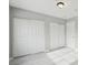 Bedroom with wood-look floors, closet, and ceiling light at 2123 Sleepy Ct, Las Vegas, NV 89106