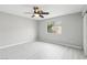 Bright bedroom featuring wood-look flooring and a ceiling fan at 2123 Sleepy Ct, Las Vegas, NV 89106
