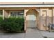 Cozy townhome entrance with security door and mature landscaping at 2123 Sleepy Ct, Las Vegas, NV 89106