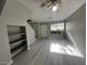 The living room features neutral walls, ceiling fan, and new vinyl plank flooring at 2123 Sleepy Ct, Las Vegas, NV 89106