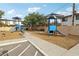 Community playground featuring multiple play structures, benches, and landscaped areas at 2123 Sleepy Ct, Las Vegas, NV 89106
