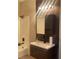 Modern bathroom featuring sleek vanity, well-lit mirror, and a shower-tub combo at 2151 Hussium Hills St # 207, Las Vegas, NV 89108