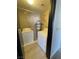 Functional laundry room with washer, dryer, and water heater for convenience at 2151 Hussium Hills St # 207, Las Vegas, NV 89108