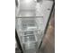 The inside of the refrigerator features multiple shelves and storage compartments at 2151 Hussium Hills St # 207, Las Vegas, NV 89108