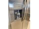The stainless steel refrigerator with ice and water dispenser with a jar filling up with water at 2151 Hussium Hills St # 207, Las Vegas, NV 89108