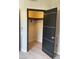 A view of the walk-in closet, featuring custom shelving and rod space at 2151 Hussium Hills St # 207, Las Vegas, NV 89108