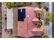 Close aerial view of a residence with solar panels, patio, and desert landscaping at 2319 Hardin Ridge Dr, Henderson, NV 89052