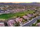 Enjoy the beauty of this golf course community with lush greenery, desert landscape, and mountain views at 2319 Hardin Ridge Dr, Henderson, NV 89052