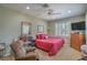 Bedroom featuring a ceiling fan, shutters, and carpet floors at 2319 Hardin Ridge Dr, Henderson, NV 89052