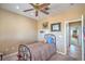 Comfortable bedroom with a ceiling fan and a view of the entryway at 2319 Hardin Ridge Dr, Henderson, NV 89052