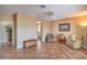 Open living room featuring tile floors, neutral paint, and a ceiling fan at 2319 Hardin Ridge Dr, Henderson, NV 89052