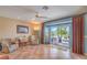 Cozy living room with ceiling fan and access to backyard patio at 2319 Hardin Ridge Dr, Henderson, NV 89052