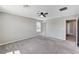 Large bedroom featuring a ceiling fan and plush carpet at 2456 Bagnara Pl, Henderson, NV 89044