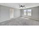 Bedroom featuring two sunny windows with ample natural light and closet at 2456 Bagnara Pl, Henderson, NV 89044