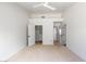 Open bedroom featuring a large walk-in closet and multiple access doors at 2913 Hawksdale Dr, Las Vegas, NV 89134