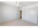 Comfortable bedroom with carpet, a ceiling fan, and access to closet storage at 2913 Hawksdale Dr, Las Vegas, NV 89134
